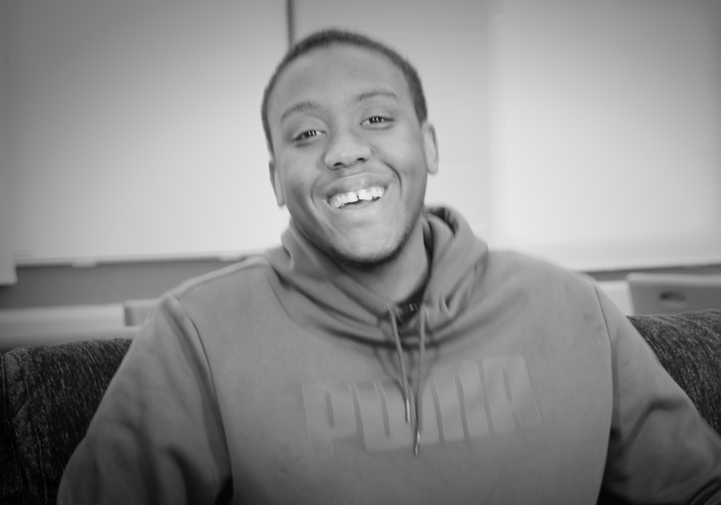 young adult man laughing