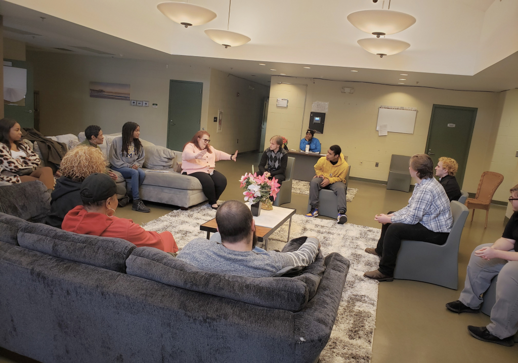 group of people sat around talking